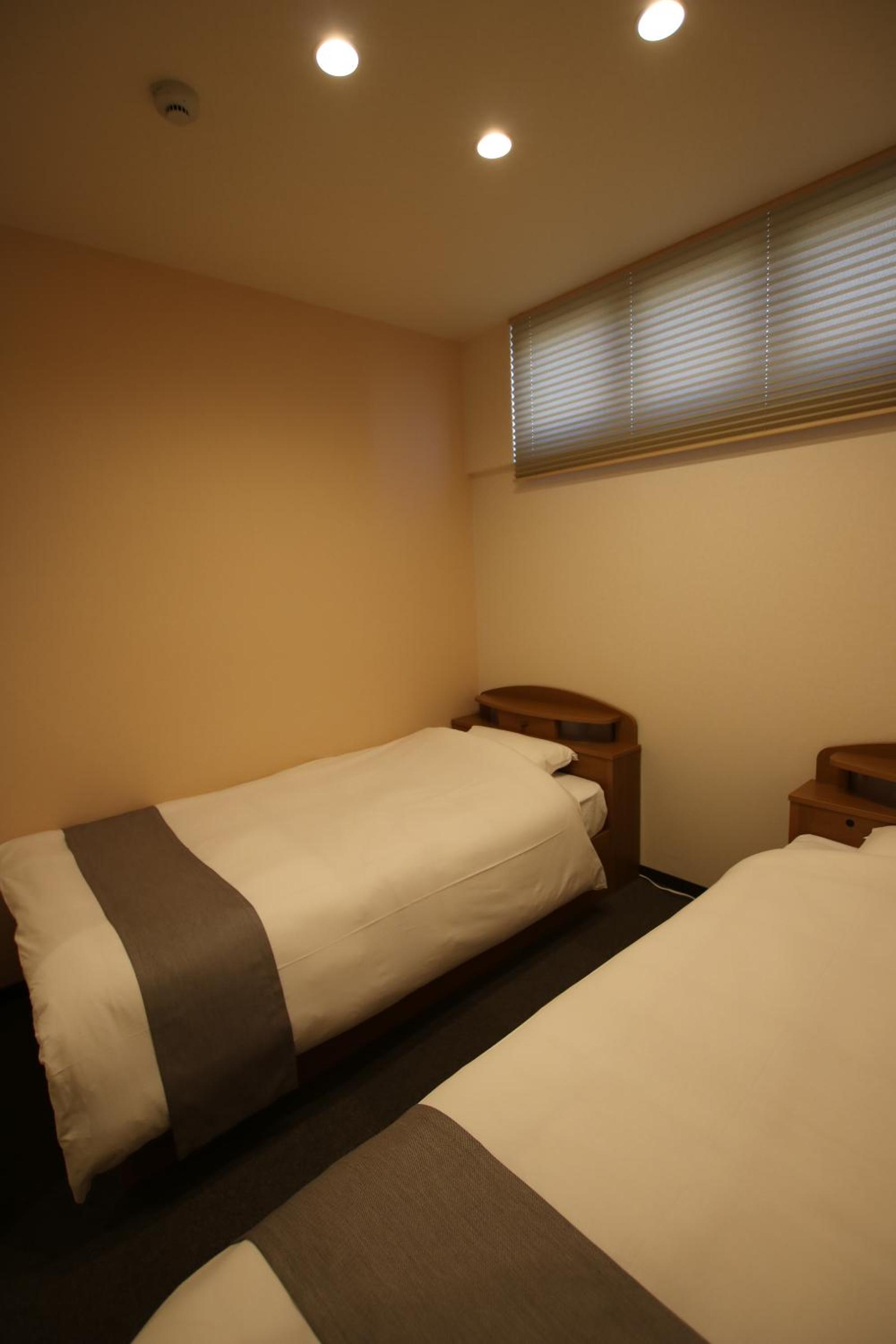 Small Twin Room With Shared Bathroom 203