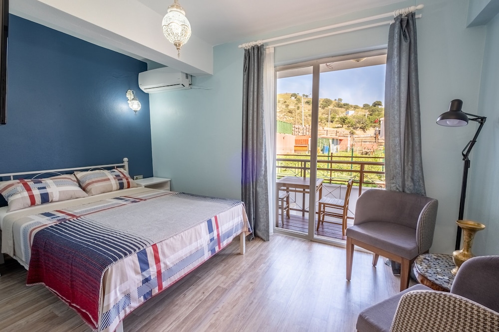 Standard Double Room, Balcony, Garden View