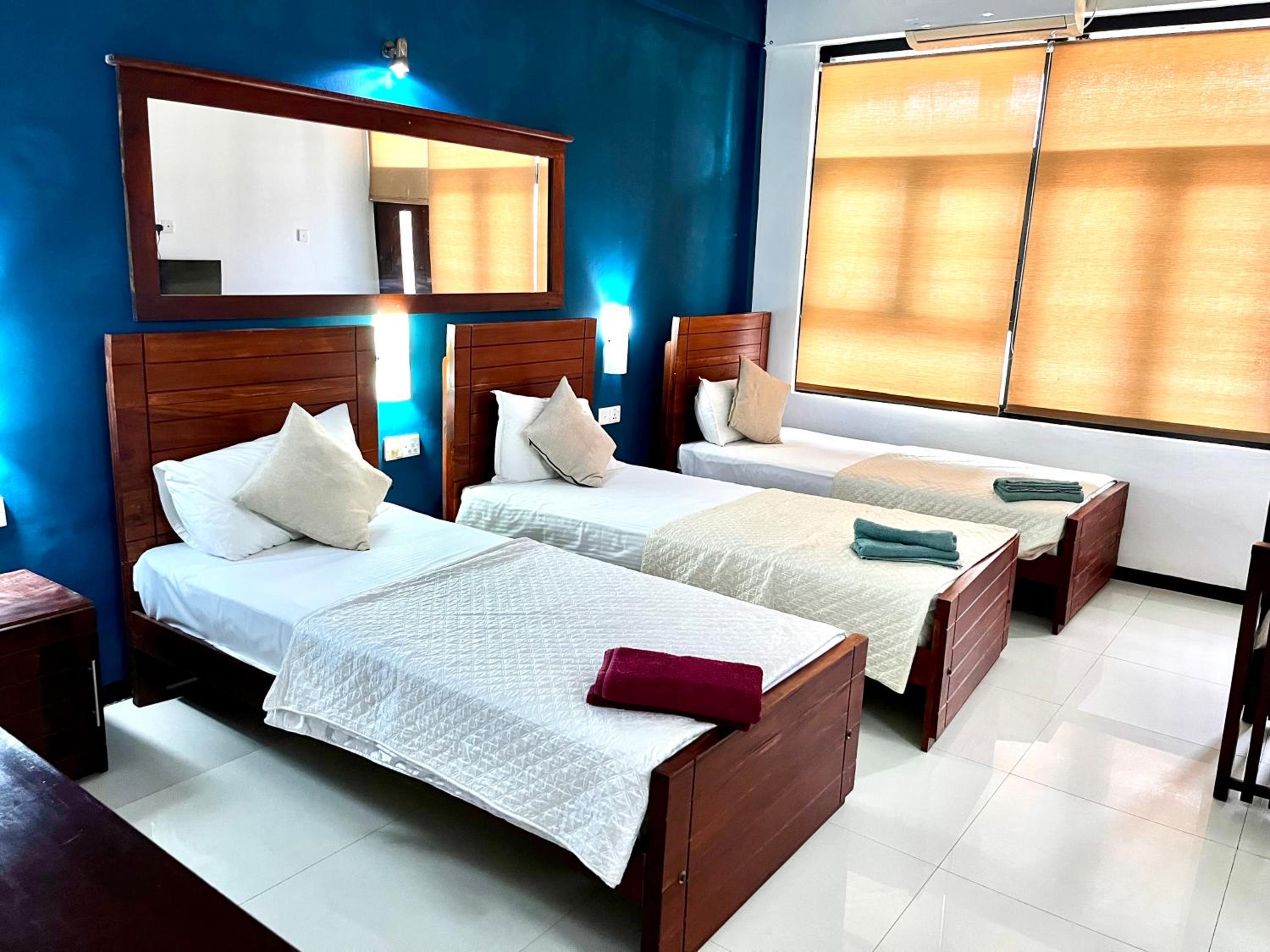 Deluxe Triple Room