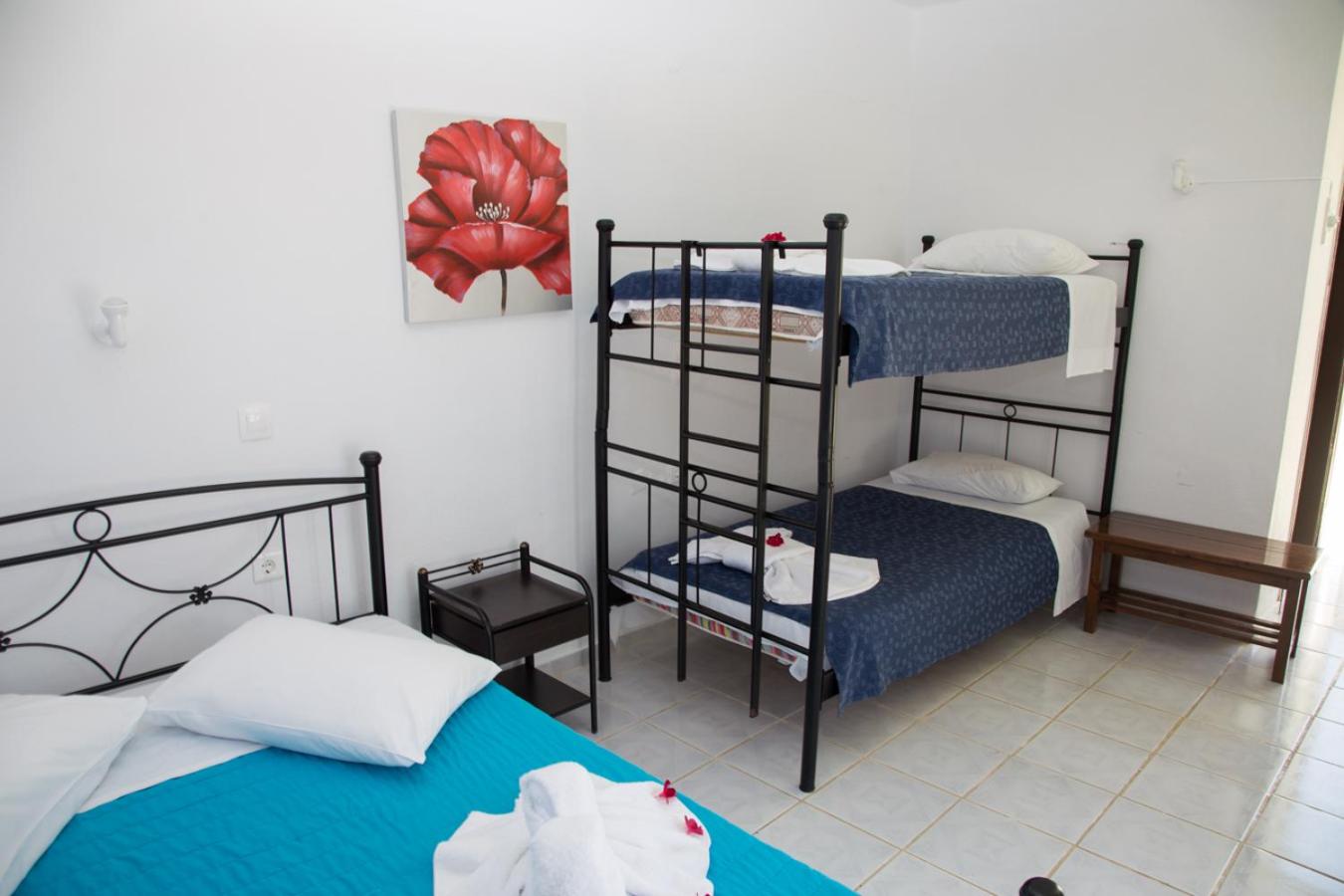 Quadruple Room with Balcony (2 Adults + 2 Children)