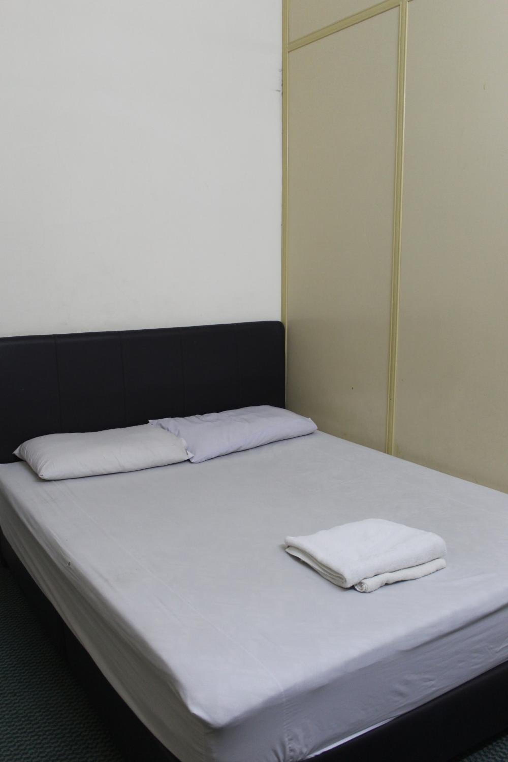 Queen Room with Shared Bathroom