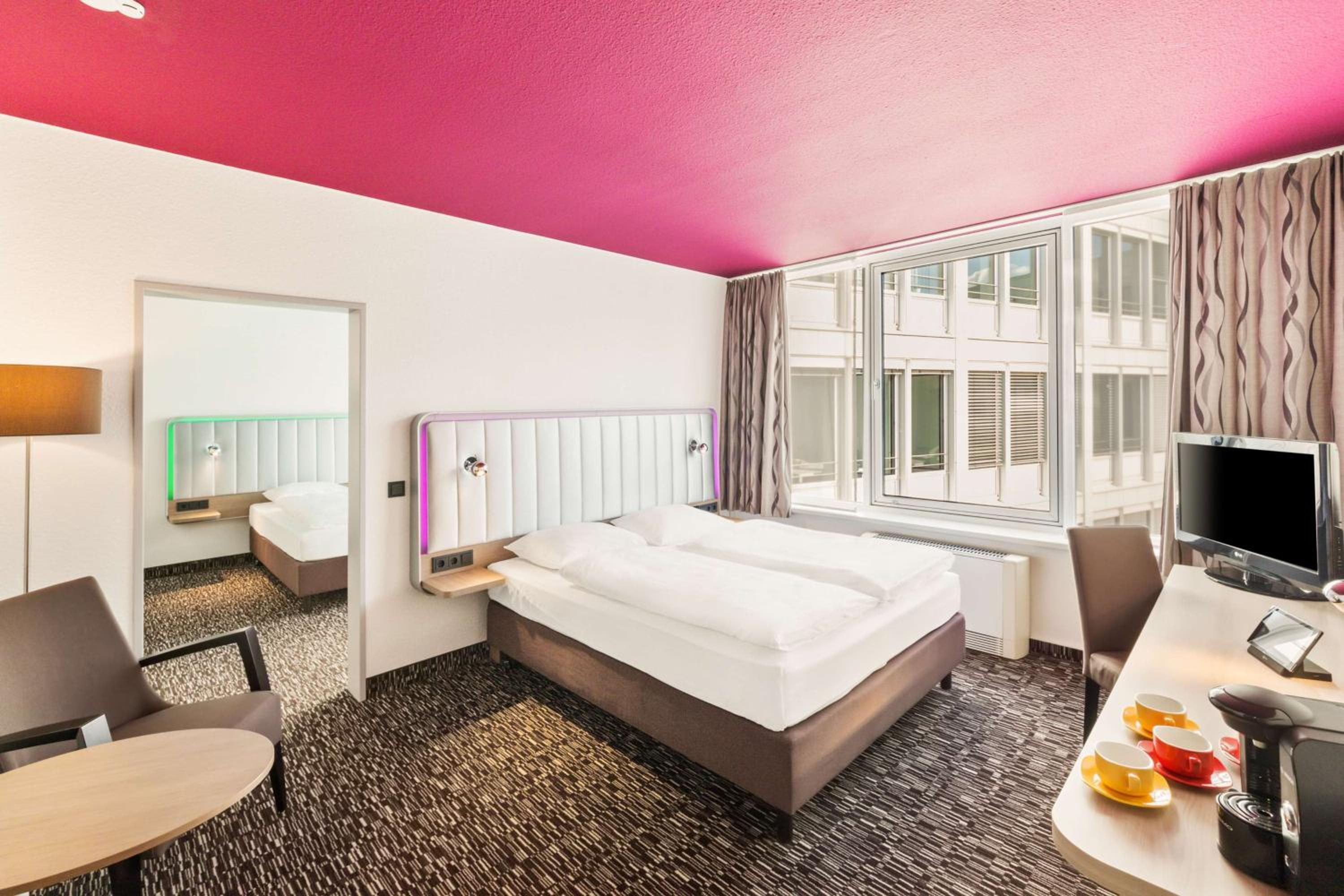 Two-Room Family Room with One Double and Two Single Beds