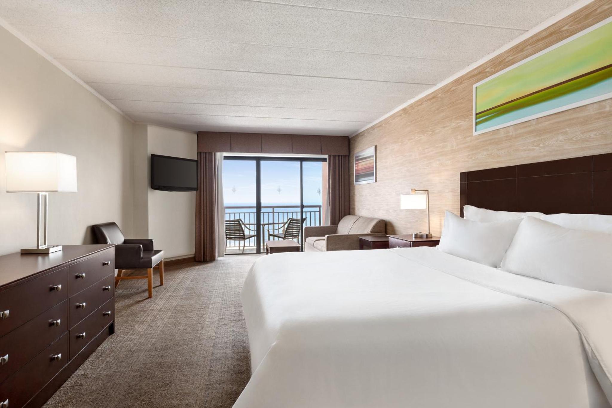 King Suite with One King Bed - Pool View and Oceanfront - Communication Accessible Tub