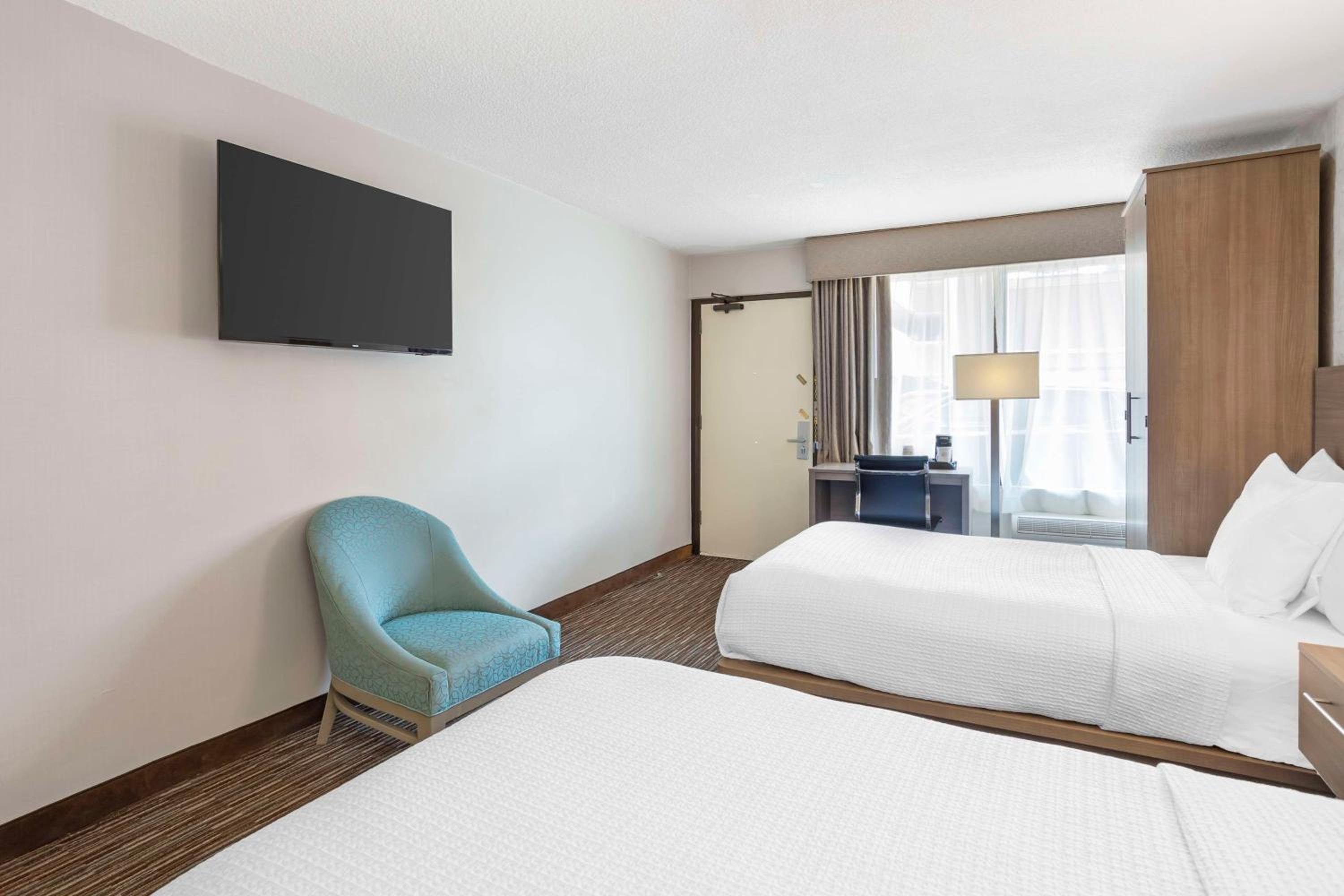 Double Room with Two Double Beds and Mobility Accessible Roll-In Shower