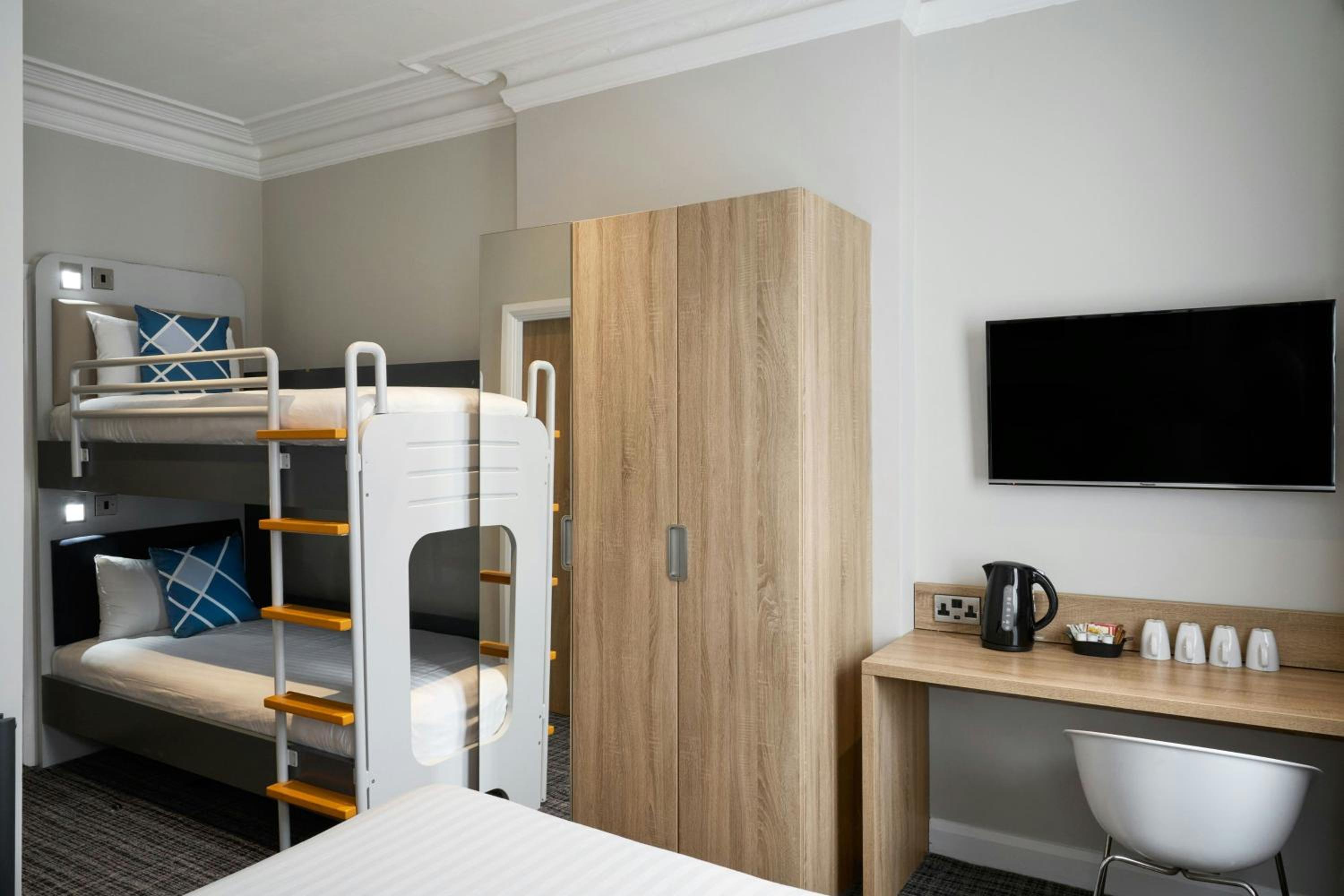 Family Room with One Double Bed and Two Bunk Beds